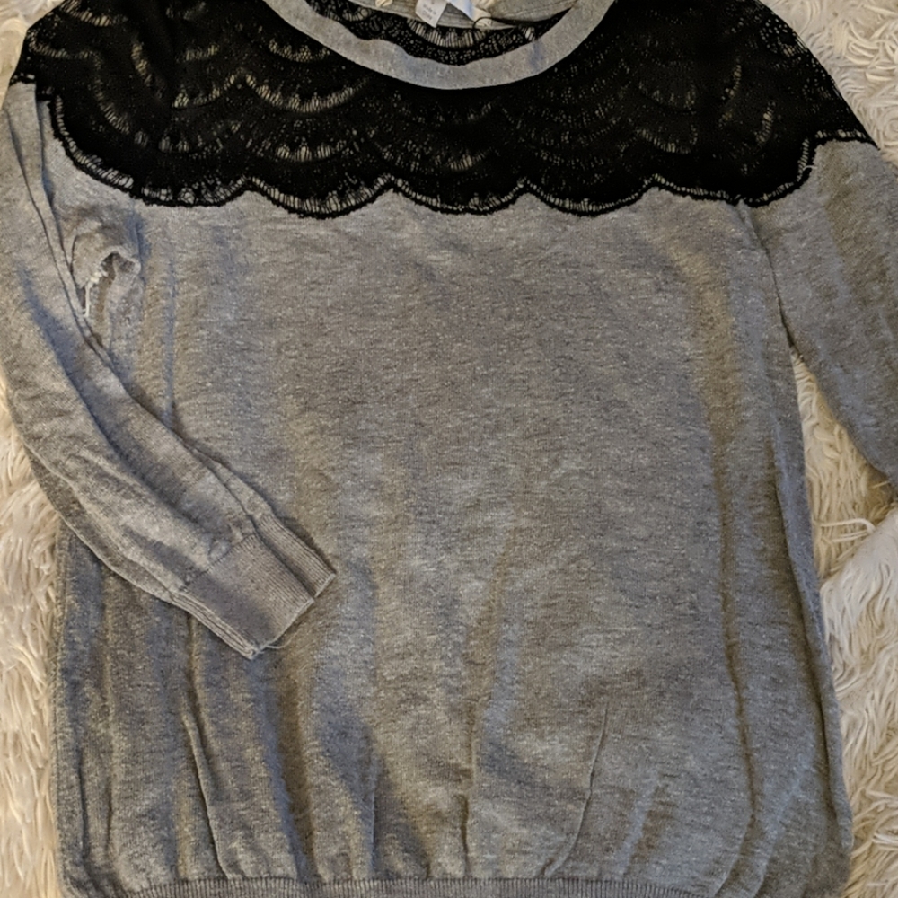 Gray sweater with eyelash detail